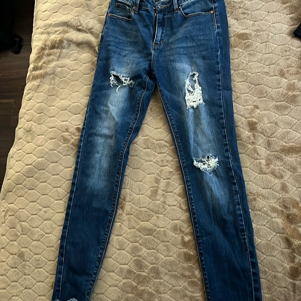 K’s More brand. Dark wash blue jeans in good condition. Size 5. Skinny jeans.
